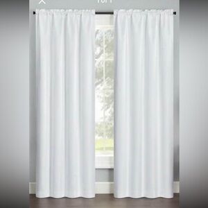 White black out curtains NWOT 40x63                      2 panels cover 1 window